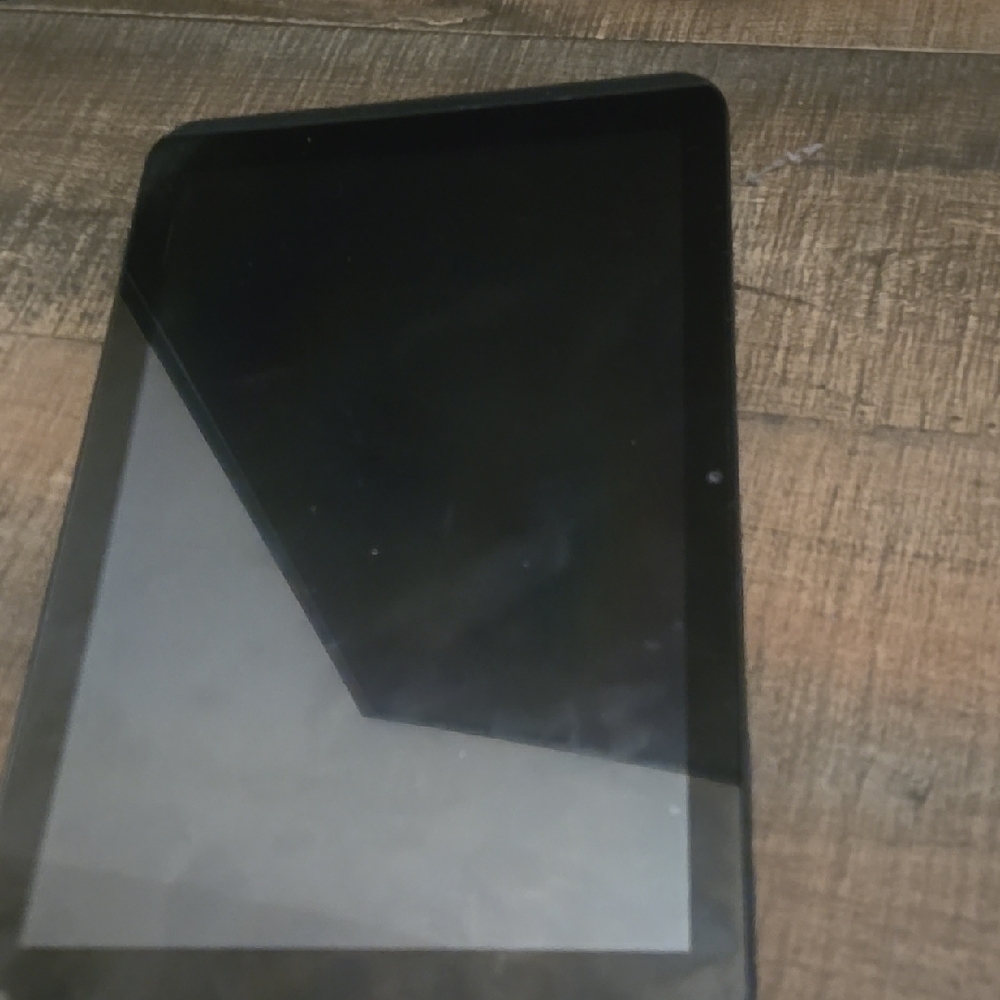 Black Tablet with Protective Case and Reflective Screen